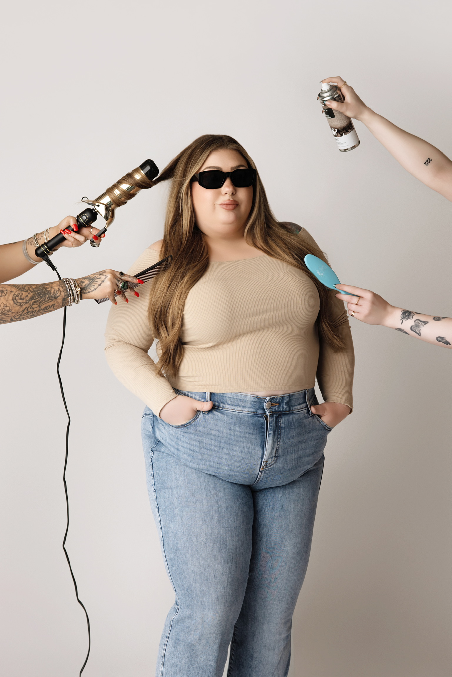 woman getting hair styled